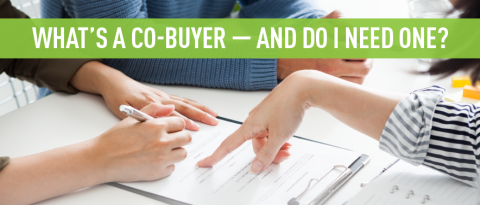 People sitting around a table looking at form with a person pointing to a specific spot on the form; text reads "What's a co-buyer — and do I need one?"